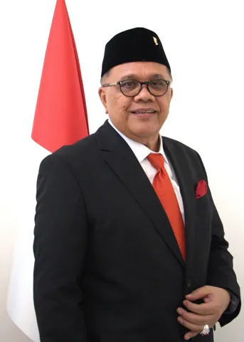 H.E. Prof. Dr. Junimart Girsang